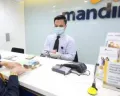 Syarat pengajuan, tabel angsuran, serta mekanisme KUR Mandiri 2026. (Sumber: Bank Mandiri)