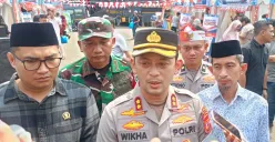 Kapolres Bogor AKBP Wikha, menjelaskan rekayasa lalin pada saat kirab bendera pusaka merah putih, Rabu, 13 Agustus 2025. (Sumber: Poskota/Giffar Rivana)