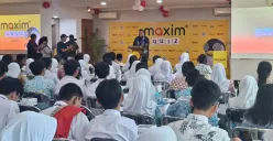 Development Director Maxim Indonesia, Dirhamsyah saat pembukaan acara Quiz di Ruang Serbaguna Kantor Pusat Maxim Indonesia, Jakarta, Jumat, 15 Agustus 2025. (Sumber: Poskota/Angga Pahlevi)