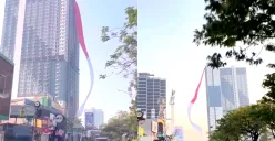 Potret bendera Merah Putih raksasa yang berkibar di gedung tinggi yang berada di wilayah Depok. (Sumber: Instagram/@depok24jam)