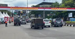 Sejumlah kendaraan memasuki kawasan Wisata Puncak via Gadog saat Hari Raya Natal. (Sumber: Poskota/Giffar Rivana)