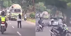 Momen seorang wanita nekat menabrakkan diri ke kendaraan yang melintas di Jombang. (Sumber: Tangkap Layar Instagram/@fakta.indo)