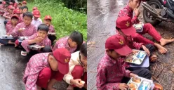 Para siswa SD di Sukabumi, Jawa Barat santap makanan Makan Bergizi Gratis (MBG) di pinggir jalan. (Sumber: Tangkap Layar TikTok/@rv.fathur)