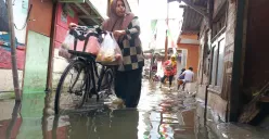 Kawasan Muara Angke, Pluit, Penjaringan, Jakarta Utara tergenang banjir rob, Minggu, 12 Januari 2025. (Sumber: Poskota/Ali Mansur)