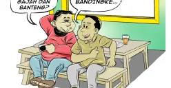 Dua pria tengah ngobrol santai di warteg membahas perbandingan antara gajah dan banteng. Salah satu dari mereka menanggapi dengan guyon khas: "Ojo dibanding-bandingke..." yang artinya, jangan dibanding-bandingkan. (Sumber: Poskota/Arif Setiadi)