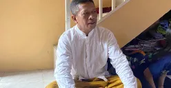 Mushofah, warga Pondok Betung, Tangsel yang namanya tertulis di paru sapi kurban. (Sumber: POSKOTA | Foto: Primayanti)