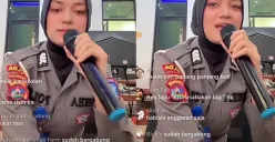 Sosok polwan yang viral lakukan live TikTok sambil nyanyi saat jam kerja. (Sumber: TikTok/@haris.james6)