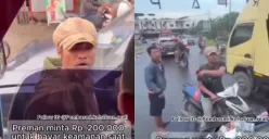 Dua preman melakukan pemalakan terhadap sopir truk di Kota Jambi dengan alasan penertiban. (Sumber: Tangkap Layar Instagram/@pembasmi.kehaluan.reall)