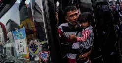 Salah satu calon pemudik yang mengikuti program Mudik Gratis Lebaran.(Sumber: Poskota/Bilal Nugraha Ginanjar)