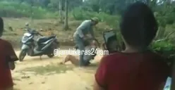 Momen seorang suami diduga melakukan penganiayaan dan ancaman kepada istrinya menggunakan celurit. (Sumber: Tangkap Layar Instagram/@jambikeras24jam)