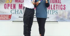 Praktik beserta istri menjadi juara menyabet medali emas di Malaysia. (Sumber: Dok. SMA Diandidaktika Cinere Kota Depok)