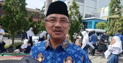Wakil Wali Kota Bekasi, Abdul Harris Bobihoe menyampaikan Pemkot Bekasi telah berkoordinasi dengan DKI Jakarta dan Pemprov Jabar untuk atasi longsor di TPST Bantargebang. (Sumber: Poskota/Nurpini Aulia Rapika)