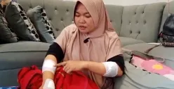 Solihat, guru SD di Tambun Selatan, Kabupaten Bekasi, menunjukkan luka yang dideritanya akibat sabetan senjata tajam pelaku begal. (Sumber: Istimewa)
