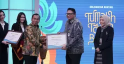 Penyerahan apresiasi dari BKKBN kepada Bank Mandiri atas kontribusinya dalam program percepatan penanggulangan stunting dan peningkatan kualitas gizi masyarakat. (Sumber: Istimewa)