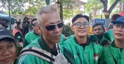Arief (kiri) dan Riska (kanan), driver ojol yang bertemu Wapres RI Gibran Rakabuming Raka usai mengikuti aksi damai di kawasan Monas, Jakarta Pusat, Selasa, 2 September 2025. (Sumber: POSKOTA | Foto: Pandi Ramedhan)