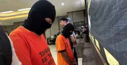 Dua orang pelaku pencabulan di Ciampea, Kabupaten Bogor, yang ditangkap polisi setelah video keluhan dari orang tua korban viral. (Sumber: POSKOTA | Foto: Giffar Rivana)