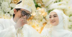 Potret pernikahan Dzawin Nur dengan Renny Rachmawaty. (Sumber: Instagram/@dzawin_nur)