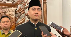 Wakil Ketua DPRD DKI Jakarta Wibi Andrino saat di wawancarai awak media. (Sumber: Poskota/M. Tegar Jihad)