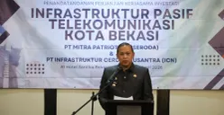 Potret Wali Kota Bekasi, Tri Adhianto dalam kegiatan penandatanganan kerja sama investasi infrastruktur pasif telekomunikasi pada Senin, 20 April 2026. (Sumber: Istimewa)