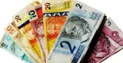 Ilustrasi berbagai mata uang dunia, dengan Dinar Kuwait menjadi yang terkuat pada 2026 berdasarkan nilai tukar terhadap dolar AS. (Sumber: Istimewa)