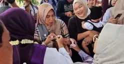 Situasi posyandu di wilayah Kecamatan Tigaraksa, Kabupaten Tangerang. (Sumber: Poskota/ Veronica)