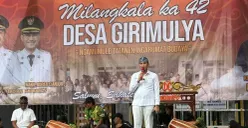 Anggota DPRD Jabar, Abdul Karim menyampaikan sambutan di acara perayaan Milangka atau Hari Jadi ke-42 Desa Girimulya, Kecamatan Cibeber, Kabupaten Cianjur, Minggu, 18 Januari 2026. (Sumber: Dok. Istimewa)