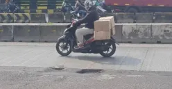 Ilustrasi, jalan rusak berlubang di Jakarta. (Sumber: Istimewa)