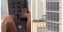 Tangkapan layar video viral yang memperlihatkan sosok pria berdiri di pinggir rooftop gedung tinggi di kawasan Jakarta Pusat saat aksi demonstrasi mahasiswa, pada Jumat, 12 Juni 2026. (Sumber: Threads/@gabriellaocv)