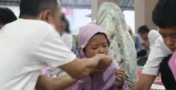 Momen warga binaan Rutan Kelas I Tangerang berbuka puasa bareng keluarga. (Sumber: Poskota/Veronica Prasetio)