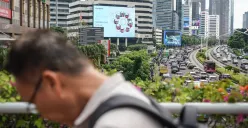 Ilustrasi pekerja di Jakarta. (Sumber: Poskota/Bilal Nugraha Ginanjar)
