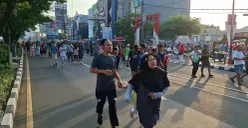 Potret ramainya masyarakat beraktivitas di CFD Margonda Depok pada Minggu, 29 Maret 2026. (Sumber: Poskota/Angga Pahlevi)