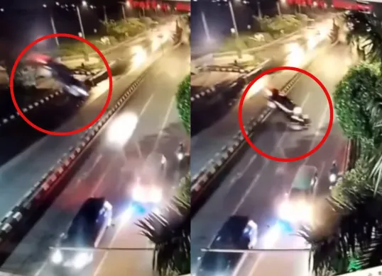 Mobil sedan terjun dari Tol Krian-Gresik hingga menghantam ruas jalan raya. (Sumber: Tangkap Layar Instagram/@medsoszone)
