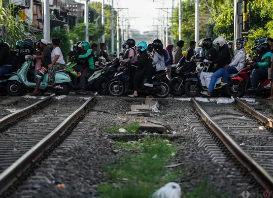 Pengendara motor. (Sumber: Poskota/Bilal Nugraha Ginanjar)
