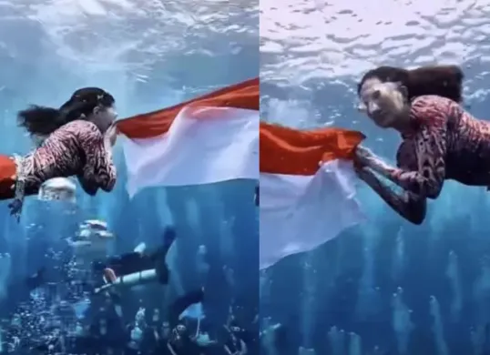 Sherly Tjoanda, Gubernur Maluku Utara, mengenakan kostum mermaid merah putih saat mengibarkan bendera di bawah laut Sulamadaha, Ternate, dalam rangka HUT ke-80 Republik Indonesia. (Sumber: TIktok)