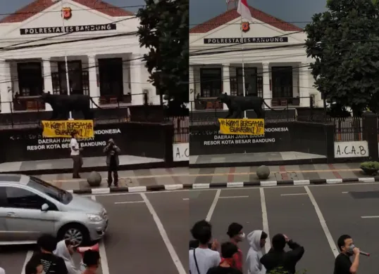 Tangkapan layar aksi kamisan di Bandung, putar lagu Bayar Bayar Bayar karya Sukatani di depan kantor polisi. (Sumber: X/sullenboy___)