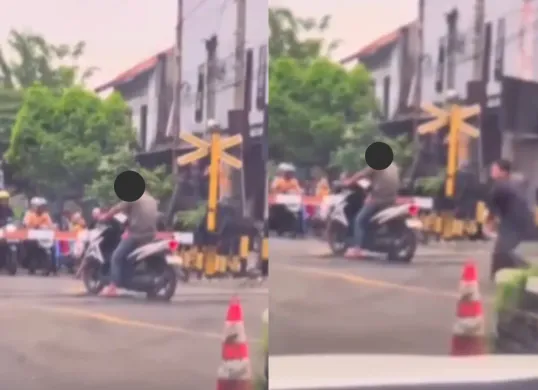 Seorang pria nekat diduga bunuh diri dengan sengaja berhenti di perlintasan kereta api saat palang pintu tertutup. (Sumber: Tangkap Layar Instagram/@funnelmedia)