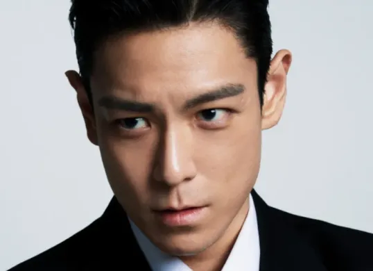 T.O.P ex Big Bang akhirnya kembali melakukan wawancara setelah sebelas tahun vakum. (Sumber: Allkpop)