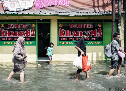 Ilustrasi banjir. (Sumber: Poskota/Bilal Nugraha Ginanjar)