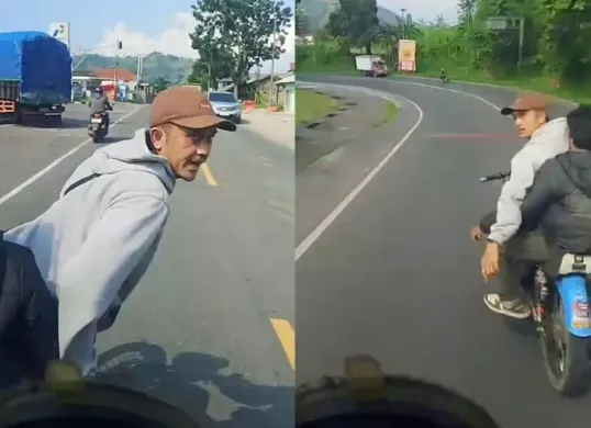 Tangkapan layar video viral pengendara motor stop sopir truk di Jalan Raya Bandung-Garut. (Sumber: Istimewa)