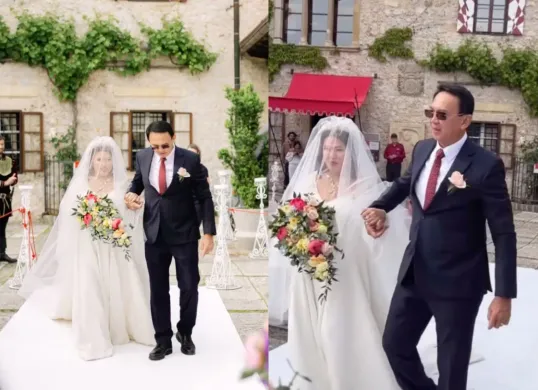 Potret Fifi Lety yang dituntun oleh Basuki Tjahaja Purnama atau Ahok saat hari pernikahan yang berlangsung pada 25 Mei 2025 di Gereja Bled Castle, Slovenia. (Sumber: Instagram/fifiletytjahajapurnama)