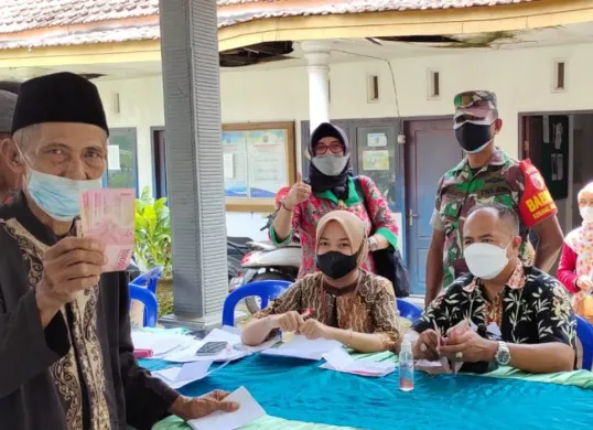 Berikut ini cara untuk cairkan dana bantuan PKH tahap 1 2025 melalui Kantor Pos. (Sumber: Dok/probolinggokab.go.id)