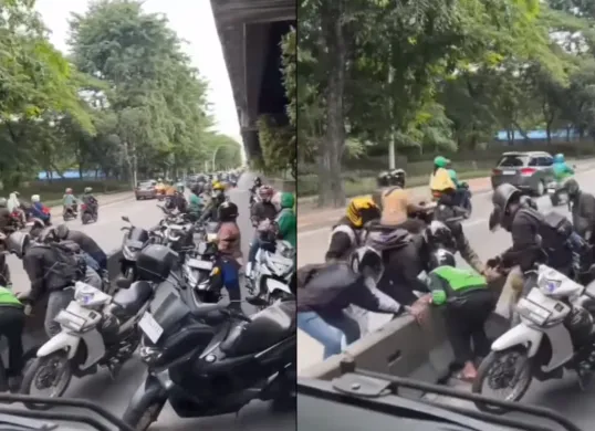 Momen sejumlah pengendara motor mencoba membongkar pembatas jalur Transjakarta. (Sumber: Tangkap Layar Instagram/@medsoszone)