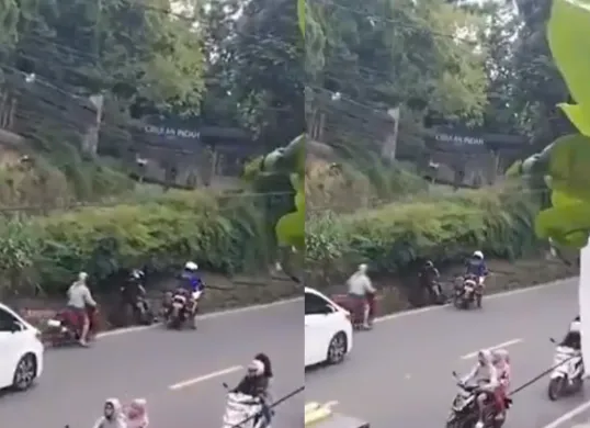 Video viral di media sosial, Patwal menendang pengendara motor hingga tersungkur. (Sumber: Tangkapan Layar X/@neVerAl0nely)