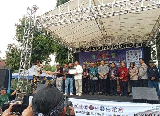 Kemeriahan acara Hari Pers Nasional (HPN) 2025 di Gedung Juang Tambun, Tambun Selatan, Kabupaten Bekasi. Dihadiri oleh Wali kota Bekasi. (Sumber: Poskota/Nurpini Aulia Rapika)