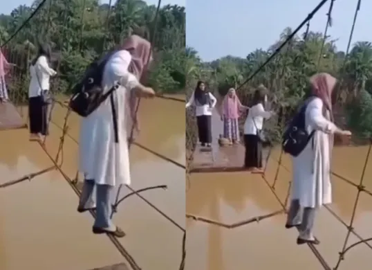 Momen sejumlah guru SD di Jambi nekat menyeberangi jembatan rusak untuk mengajar. (Sumber: Tangkap Layar Instagram/@medsoszone)
