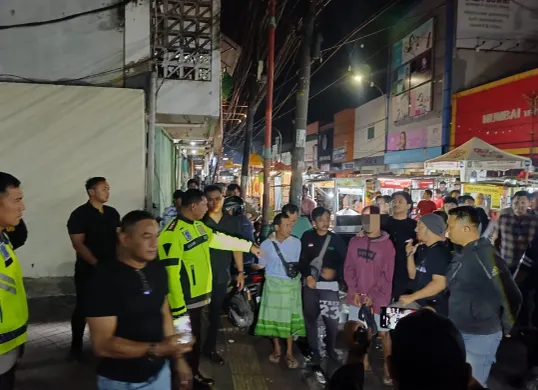 Polres Metro Tangerang Kota menangkap seorang preman berinisial FM alias Omo, 39 tahun di Pasar Lama, Tangerang, Banten, yang menganiaya pedagang gegara tak diberi uang japrem. (Sumber: Polres Metro Tangerang Kota)