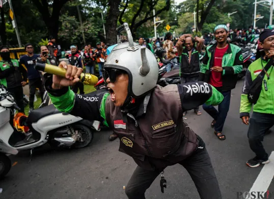 Ilustrasi - Ribuan pengemudi ojek online (ojol) bakal menggelar aksi unjuk rasa di Istana Presiden, Senin, 21 Juli 2025. (Sumber: Poskota/Bilal Nugraha Ginanjar)