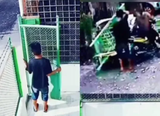 Aksi pencurian pagar rumah di Medan oleh dua orang pria dengan membawanya menggunakan sepeda motor. (Sumber: Tangkap Layar Instagram/@medsoszone)