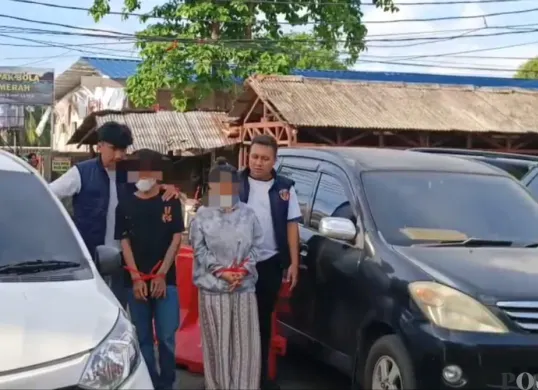 Sejoli pembuang bayi hasil hubungan gelap di Palmerah, Jakarta Barat, ditangkap. (Sumber: POSKOTA | Foto: Pandi Ramedhan)