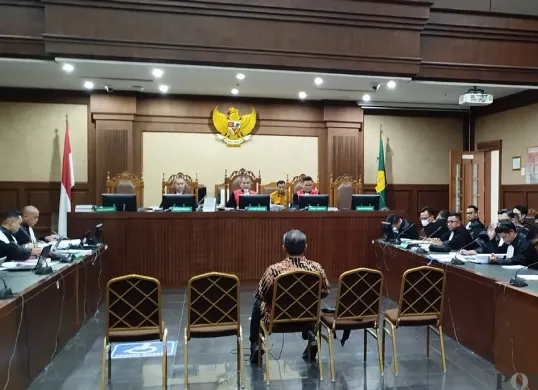 Djuyamto dihadirkan sebagai saksi atas kasus putusan onslag kasus migor di Pengadilan Tipikor Jakarta Pusat. (Sumber: POSKOTA | Foto: Ramot Sormin)